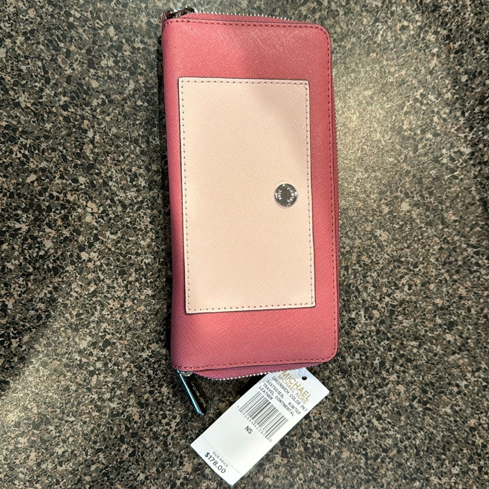 Michael Kors zipper wallet with silver tone hardware